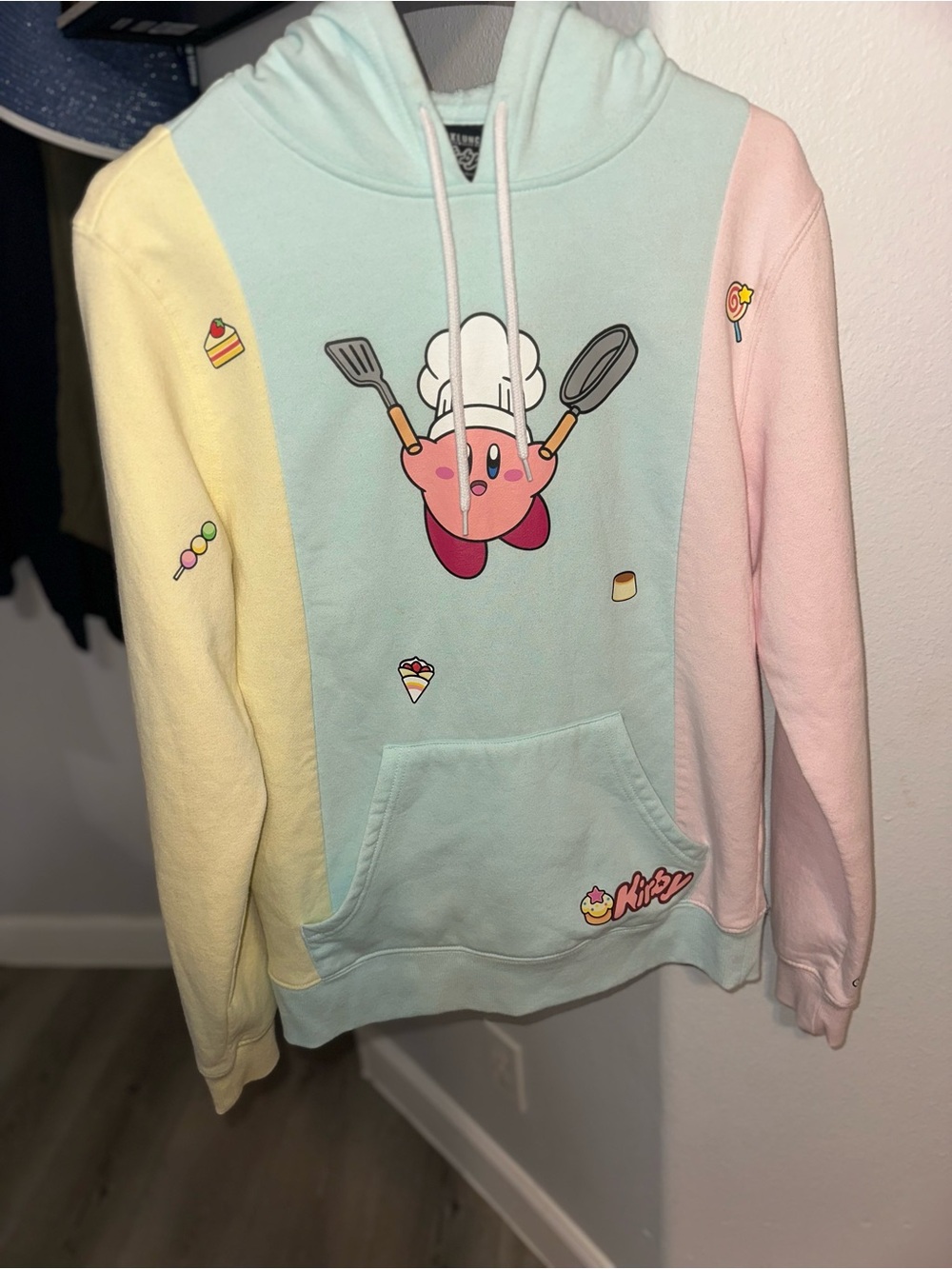 BoxLunch Pastel Colorblock Kirby Chef Hoodie - Mint, Pink & Yellow